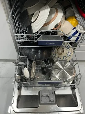 洒店洗碗机震动开关打开造声可大是什么原因