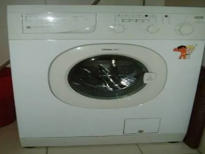 全自动洗衣机1块钱硬笔会掉下去吗(图1)