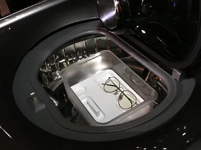 有东西掉在洗衣机内壁里(图1)