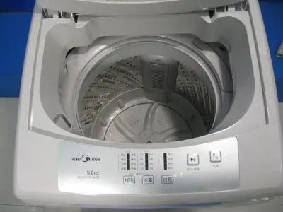 洗衣机洗完后甩干就停了是什么原因(图1)